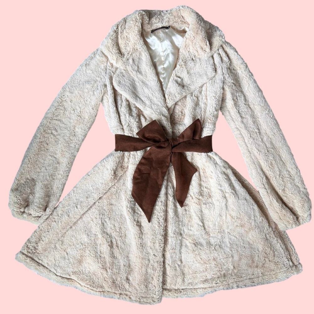 Anthropologie HazelHazelHazel Cream faux fur coat with brown bow detail
